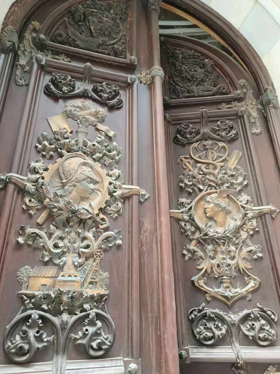 #AdoorableThursday
The 15 ft high doors of the Casa Llagostera, Calle Mayor, Cartagena, Spain featuring bronze reliefs of Minerva and industrial motifs from 1902. Building currently being renovated so could not enter. My photo.