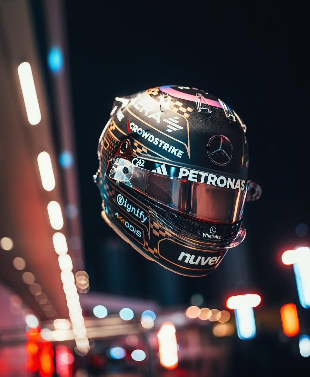 MercedesAMGPCF1's tweet photo. 🚨George and Kimi’s special Vegas helmets😮‍💨🖤🪩 https://t.co/Fhf8GkjgOF