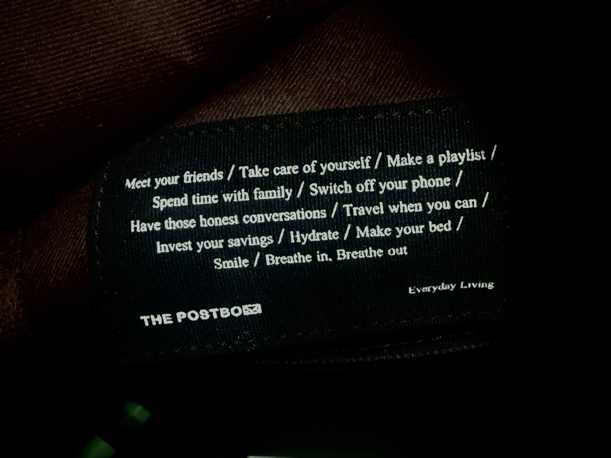 Found this tag attached to my backpack inside. <a href="/thepostboxin/">The Postbox</a> ✨