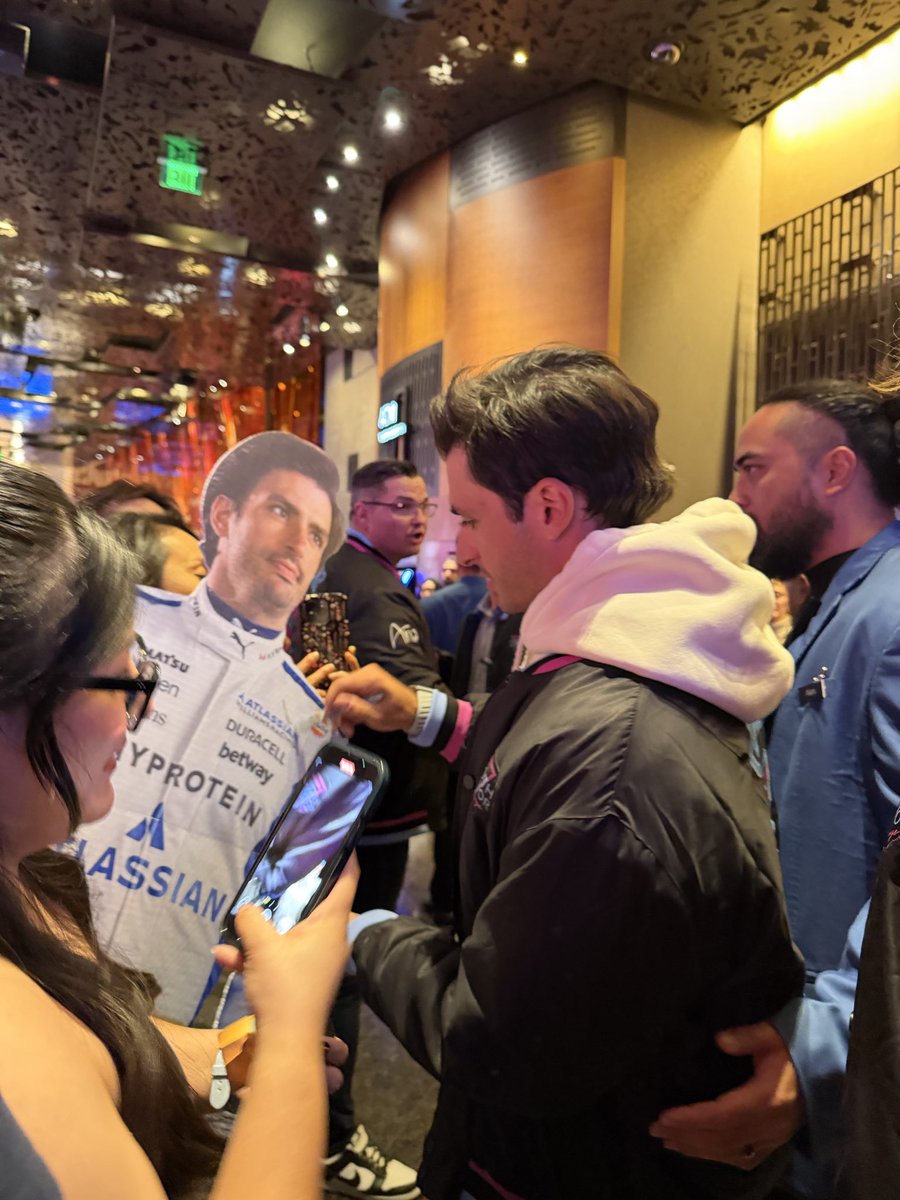 Carlos Sainz signing Carlos Sainz