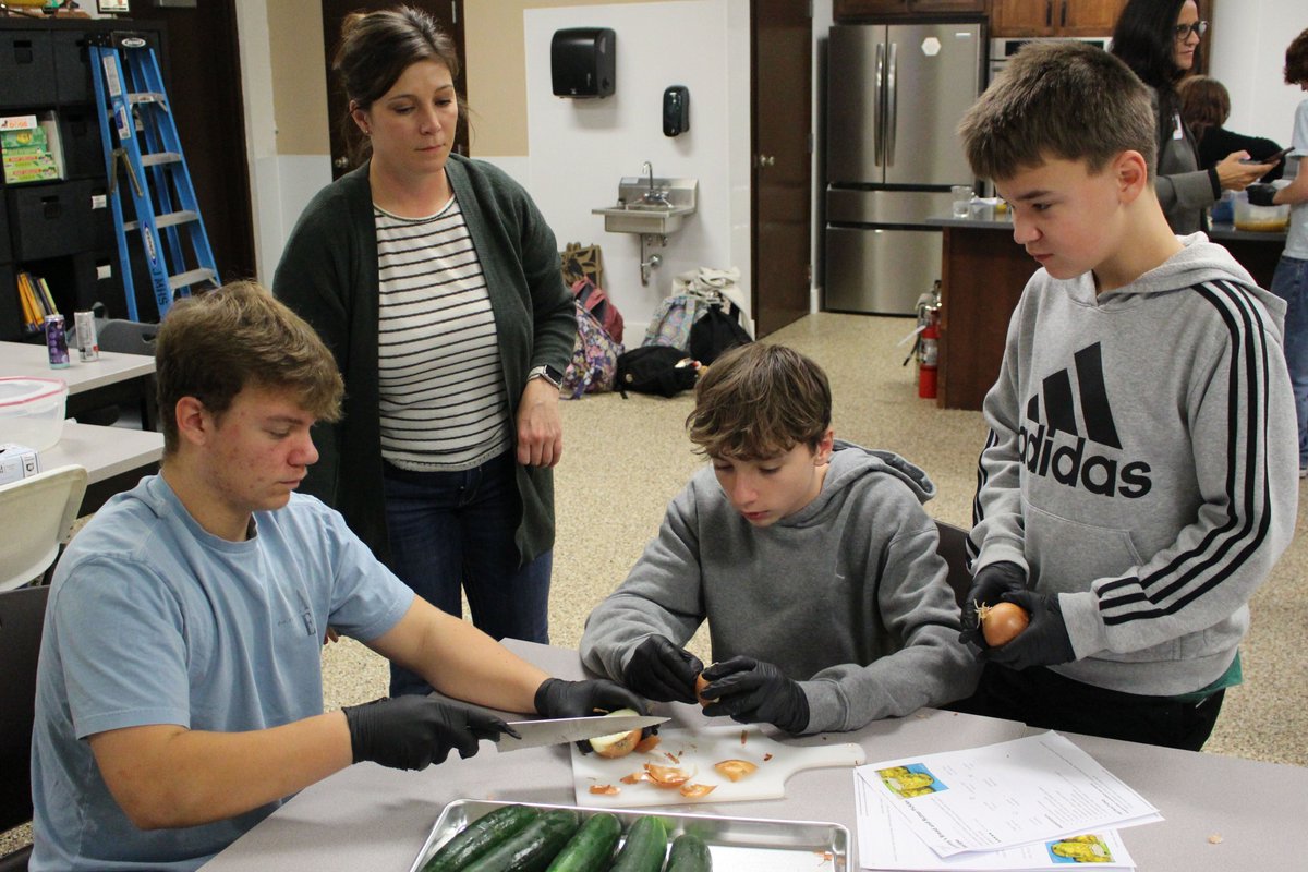 MCSWV's tweet image. @MCSWV Superintendent Dr. Shelby Haines taught students in Peyton Bertram’s Introduction to Ag class, at @JMHSMonarchs, how to make pickles and can them.

Tony Martinelli, president and CEO of WVU Medicine Reynolds Memorial Hospital, was a guest student in the class on Wednesday.