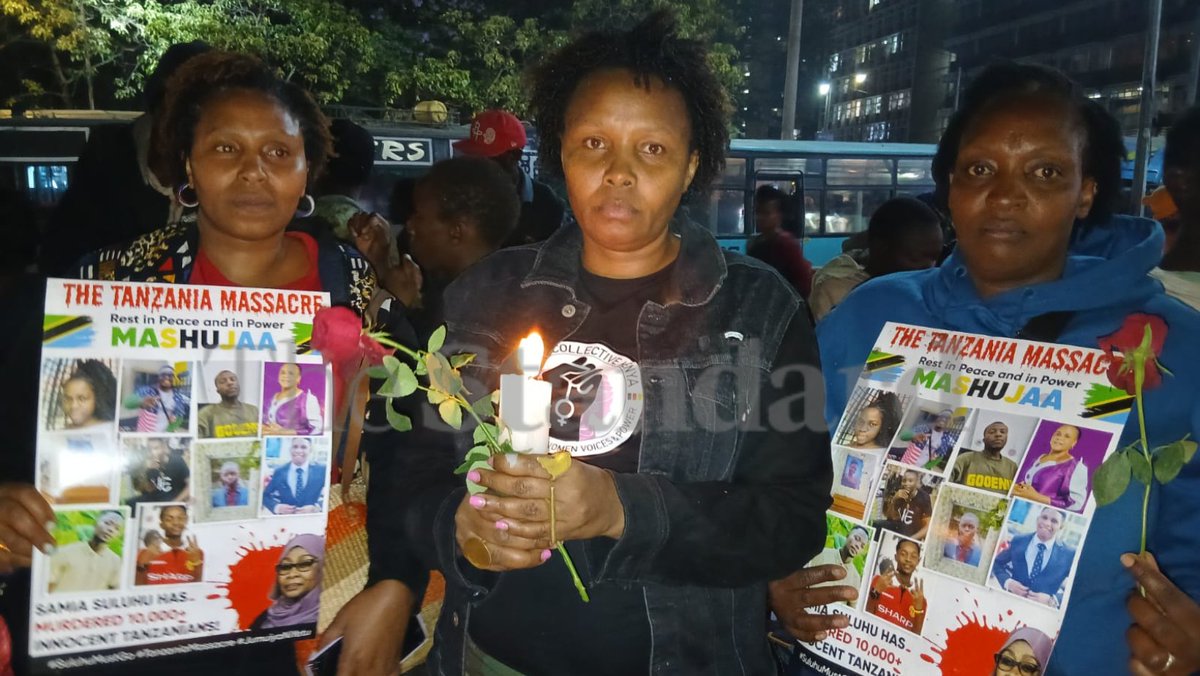 StandardKenya's tweet image. A section of Kenyans sing outside the National Archives in Nairobi during a night vigil and candlelight ceremony, held in remembrance of Kenyans and others who died during the recent post-election unrest in Tanzania.

Photos by Collins Kweyu