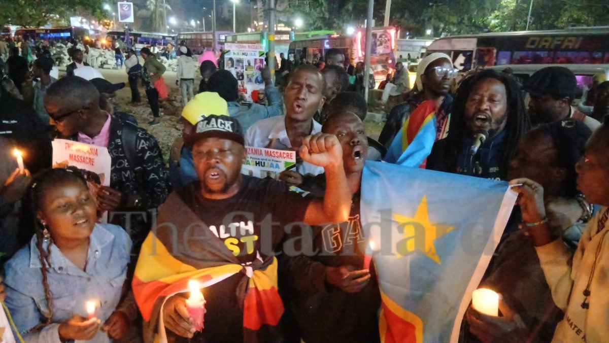 StandardKenya's tweet image. A section of Kenyans sing outside the National Archives in Nairobi during a night vigil and candlelight ceremony, held in remembrance of Kenyans and others who died during the recent post-election unrest in Tanzania.

Photos by Collins Kweyu