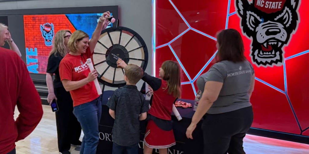 NorthStateBank's tweet image. Game day energy was strong at Reynolds Coliseum! Our team enjoyed meeting fans who took a turn at our prize wheel before tipoff of the NC State vs. Coastal Carolina matchup.

Congratulations to the Pack on the win and on holding strong at 16th in the nation!