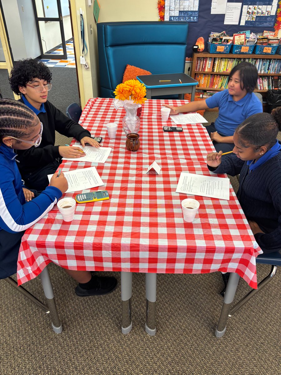 MTASaints's tweet image. To review proportional relationships, seventh grade rotated among stations to solve Thanksgiving-themed math challenges. One of the stations required students to find the # of cups of cocoa needed for a variety of people, and they were surprised with some to enjoy! #MathFun ☕