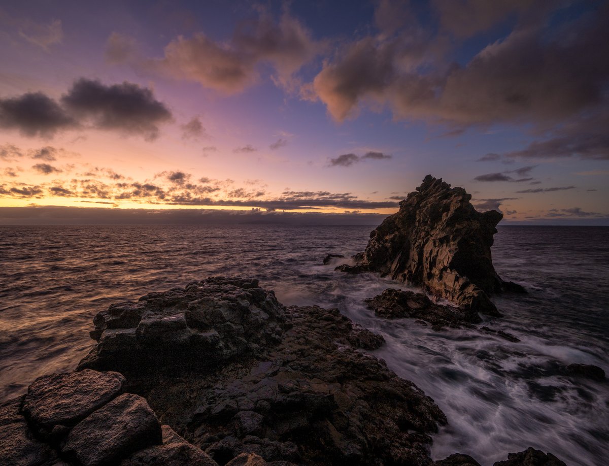 One of my favourite places on #Madeira is Devil's Rock (aka Black Devil's Tower). Early light pours in at a sharp angle, illuminating the face of the rock while the sea rushes around its base &amp; over the shallow stone. A 0.5s slow exposure captures the motion yet preserves detail.