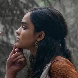 mockingjayssing's tweet image. lenore dove with hoop earrings… reminds me of another songbird