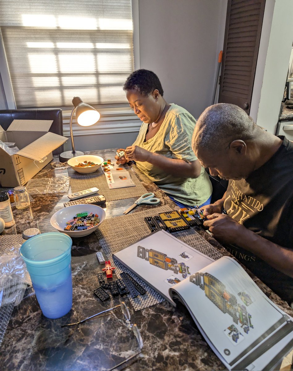 My parents working on their Lego sets!