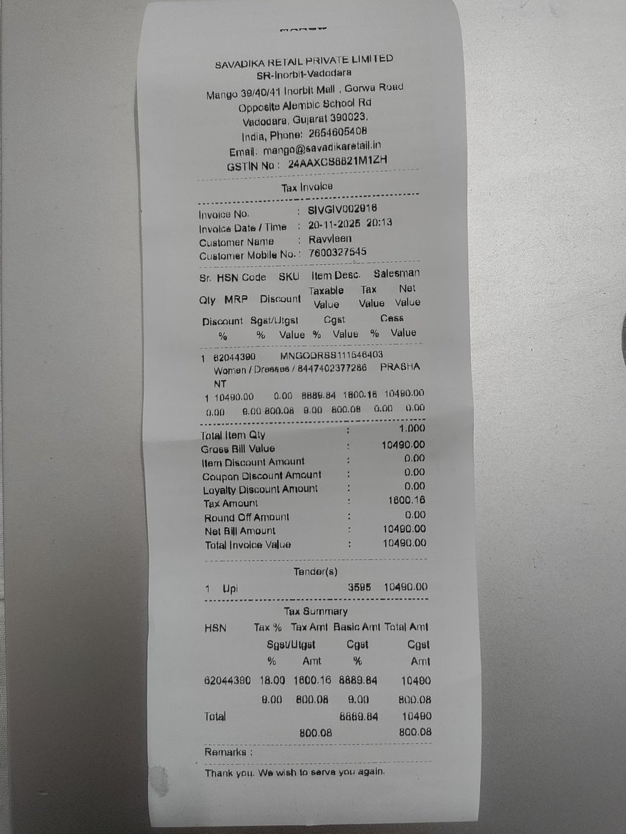 karishma_sinha's tweet photo. @Mango ​Scam alert at your store in Inorbit Mall, Vadodara. ​We were illegally charged ₹500 extra as GST on a dress priced at ₹9990. The MRP is always inclusive of all taxes. This is fraud. Please take immediate action and resolve this asap. Pictures attached below. https://t.co/lbNTxlYnlE