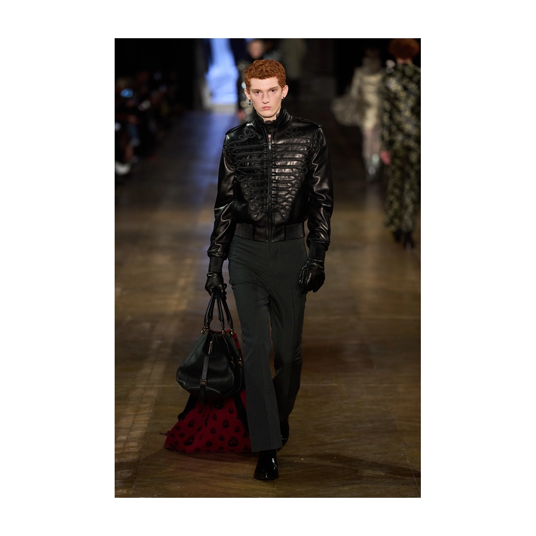 Paris' third encore song was 'I'll Never Love Again', with Gaga wearing <a href="/McQueen/">McQueen</a> Fall/Winter 2025 black leather military bomber jacket with frogging embroidery!