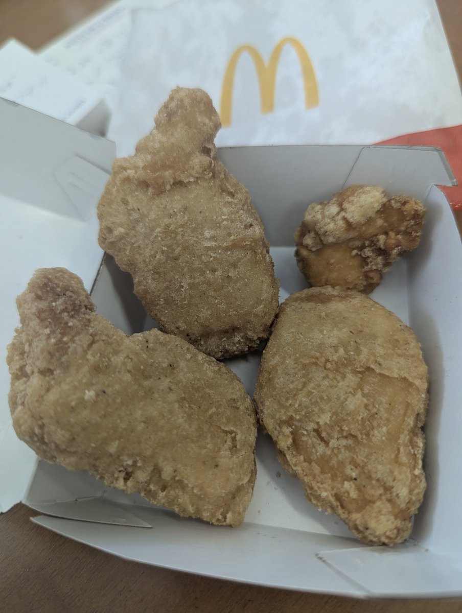 Pats_Pwr's tweet photo. @McDonalds I ordered this four piece chicken McNuggets from the 442 Wyandotte St, South Bethlehem location at lunch today and received three nuggets and a small overcooked clump of what I imagine is only breading. I wasn't going to risk eating that thing to find out. 🤢 https://t.co/ReQ1QpSQon