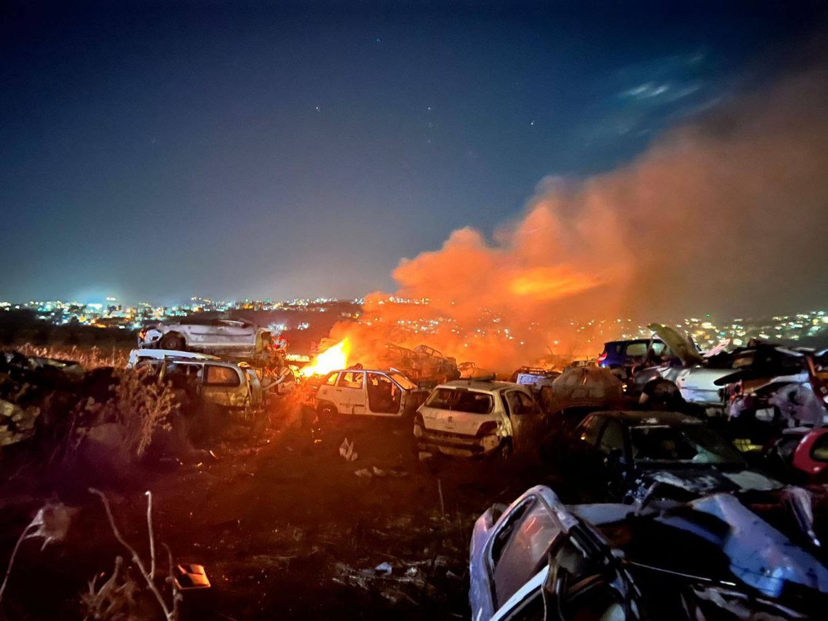 The aftermath of a fire set by Israeli settlers at a car-parts scrapyard near the town of Huwara, south of Nablus.