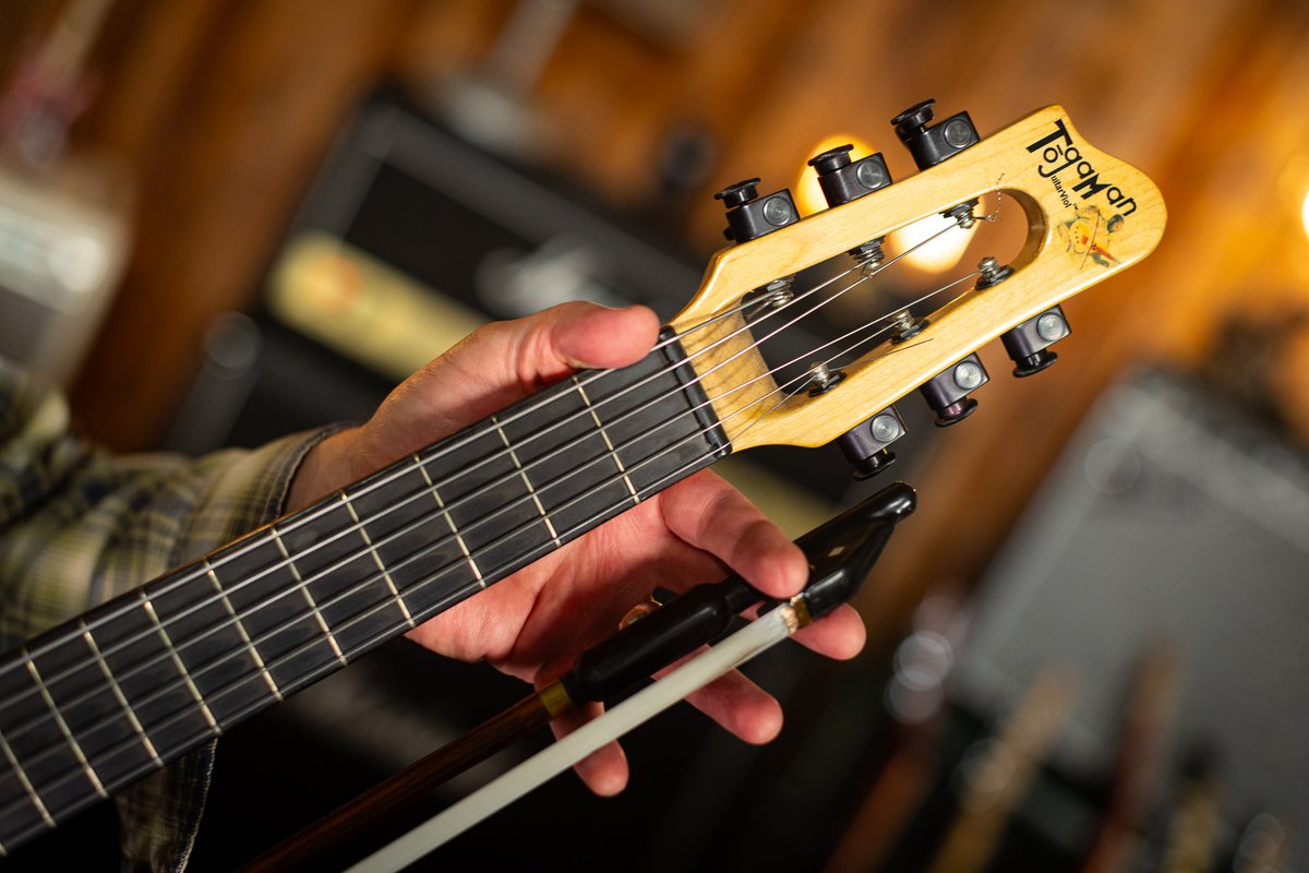 What is this sorcery? 🤯 Meet the GuitarViol — a hand-built hybrid instrument from Togaman that you actually play with a BOW. Part guitar, part cello, all cinematic mayhem. Thanks for bringing it in, <a href="/DALETURNER/">Dale Turner</a> and Loga Ramin Torkian! #guitarviol