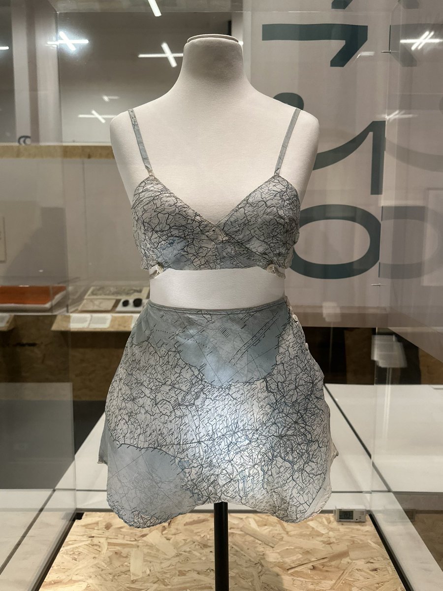 ENortonHistory's tweet photo. A lingerie set made for Lady Mountbatten in the 1940s, made of Second World War escape maps which had been printed on silk due to the fabric’s durability. With the continuation of rationing after the end of the war, this was a practical use for the maps. On display in the fabulous Secret Maps exhibition in @britishlibrary #secretmaps
