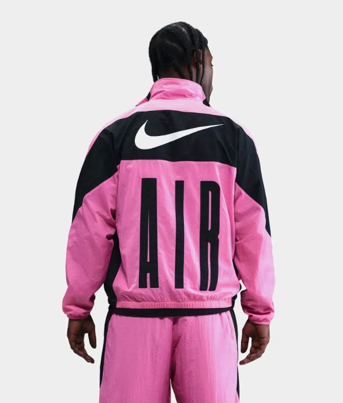 pink and black nike jogging suit