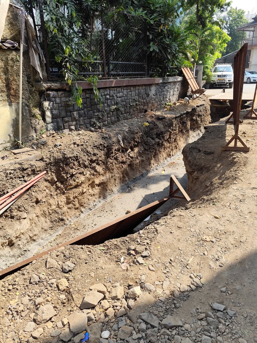 Road work with open ditches in chimbai village -- just waiting for an "accident"