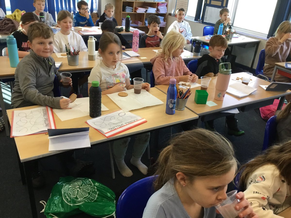 Y3 are in from the cold and enjoying hot chocolate and biscuits 😋