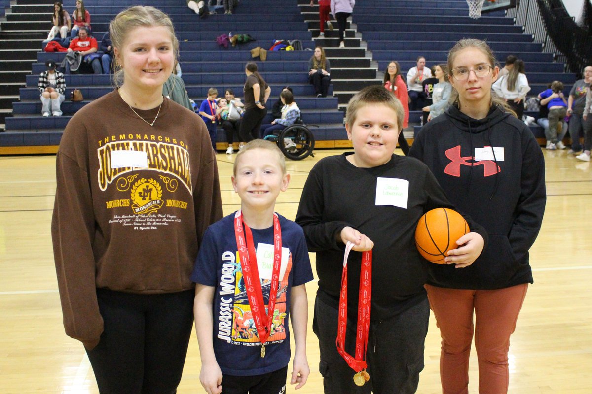 MCSWV's tweet image. More than 150 Marshall County Special Olympians hit the hardwood yesterday to compete in dribbling, shooting and passing events at the annual Special Olympics Basketball competition at JMHS. Peer tutors from Cameron High School and John Marshall High School assisted the athletes.