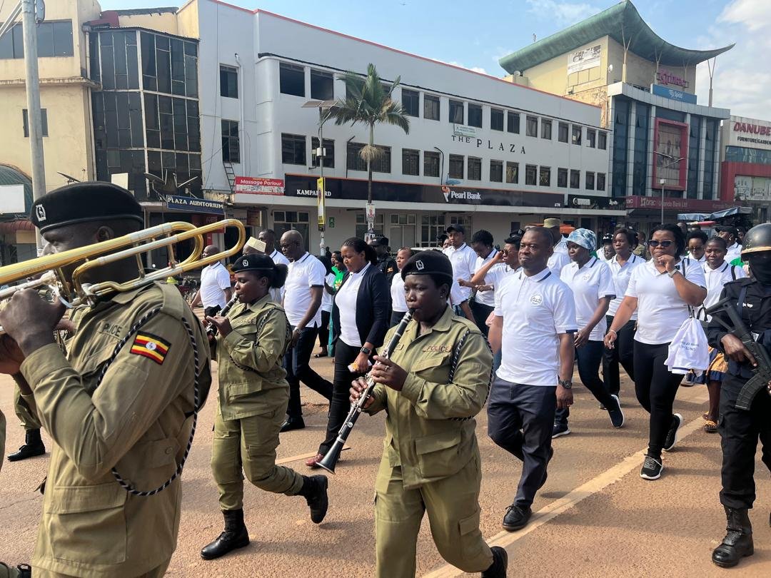 IJM_Uganda's tweet photo. The campaign featured a symbolic march through Kampala’s major streets, followed by an interactive event where citizens engaged directly with justice actors to discuss barriers to reporting and accountability. https://t.co/wBjGUjvy0S