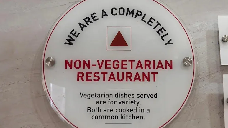ndtv's tweet photo. Kerala Restaurant's "Completely Non-Vegetarian" Signboard Goes Viral; Internet Reacts https://t.co/c3punVYgJn https://t.co/1XbT37uajy
