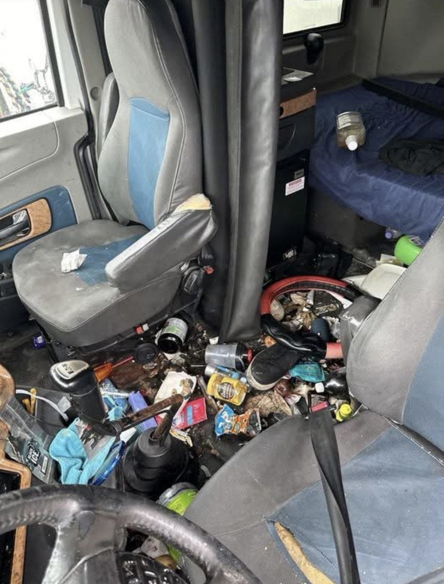 JoloTheTrucker's tweet image. If the cab looks like this, what are the odds that the driver kept up with the truck’s maintenance, record keeping and keeping the load secure ?