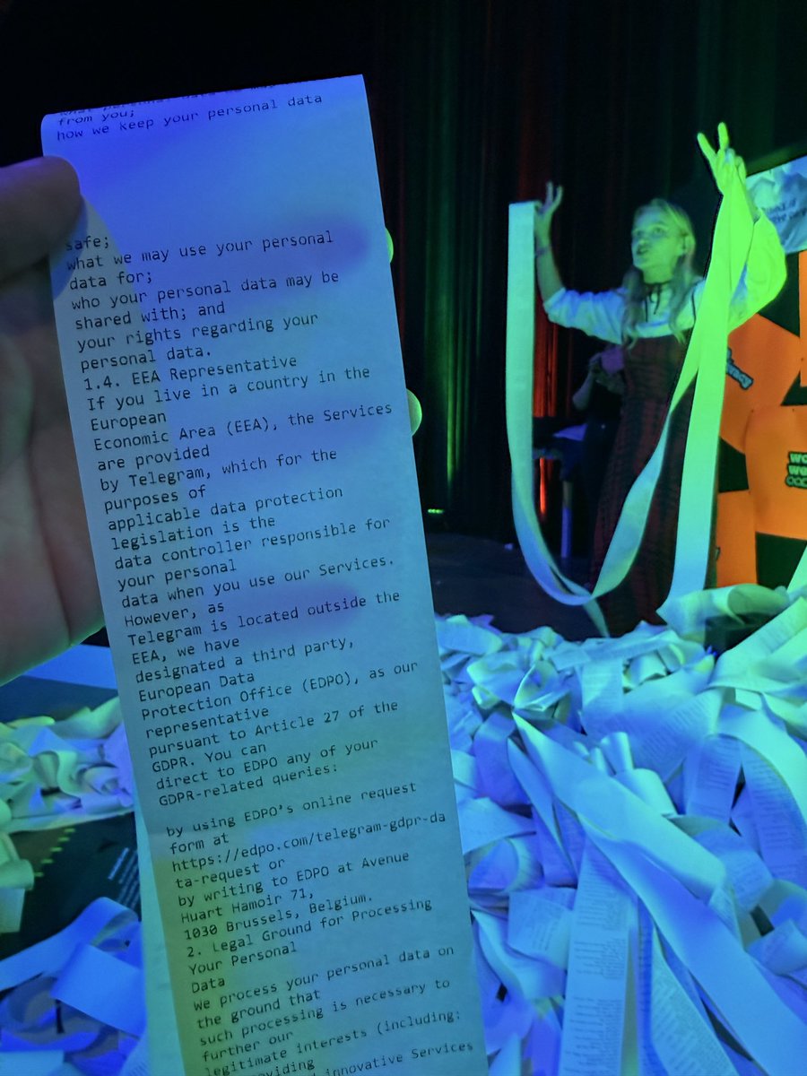 alisher's tweet image. Best art installation I’ve seen at @EFDevcon shows how much we agreed to using centralized apps, with kilometres of printed terms and conditions by @winprivacy leading to glitcharmour.org, an inclusive space to take one step at a time toward agency in the digital world.