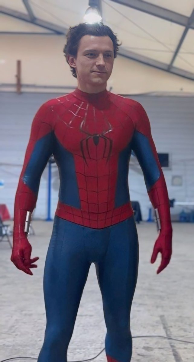This suit is hugging Tom in all the right places!!!