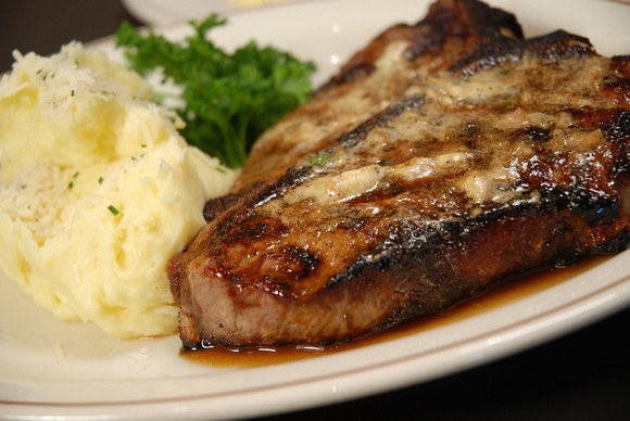 Daniel's 28 oz. Porterhouse steak topped with steak butter and served with garlic mashed potatoes is the perfect dish for any steak lover! 🥩😍

Visit danielsbroiler.com to make reservations.