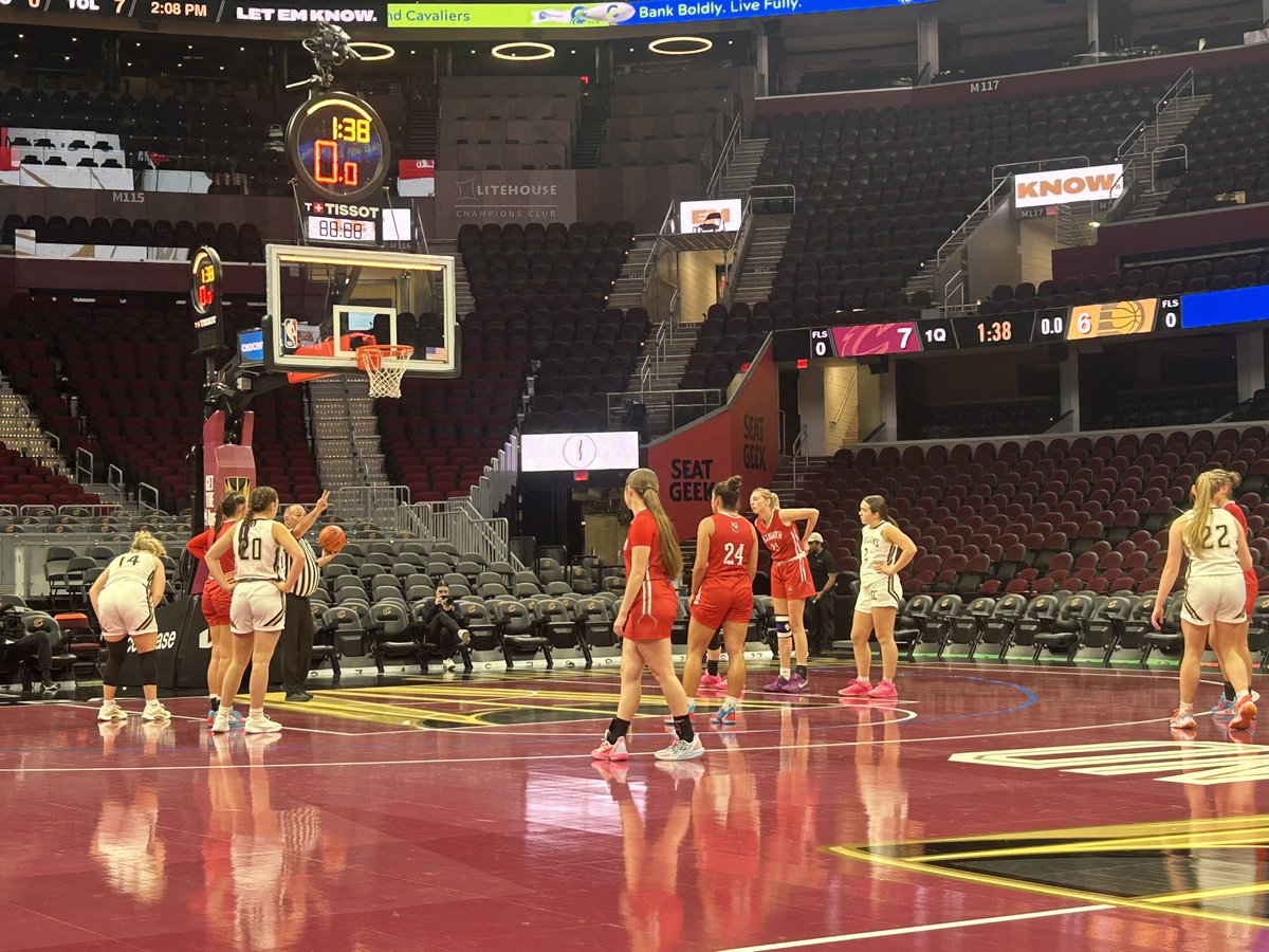 Halftime score from Rocket Arena is 13-10 as the Lady Big Red trail the Trojans.