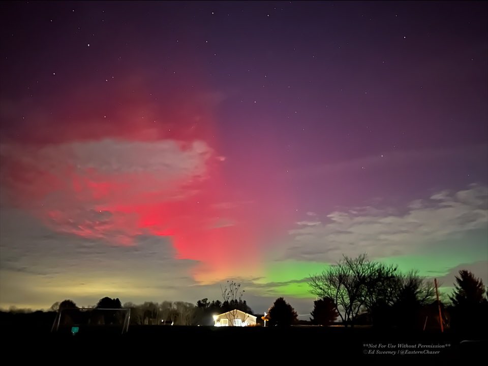 EasternChaser's tweet photo. Cleaned up photo of the “Veterans Day” aurora borealis event looking north from Landenberg, PA at 10:07 PM EST on 11/11/25. The West Grove Fire Company station building can be seen in the foreground. #pawx #aurora #aurorborealis #northernlights #stormhour https://t.co/lx9sLduF2x