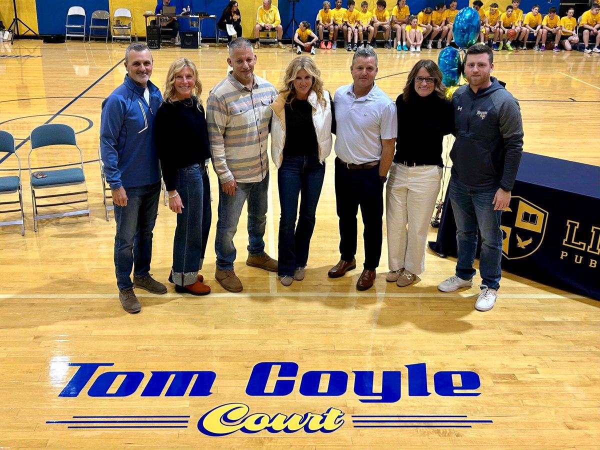 LinwoodSchools's tweet photo. At the Blue &amp; Gold Game, our school community proudly dedicated the Belhaven Middle School basketball court in honor of longtime Athletic Director, Mr. Tom Coyle.  His leadership, passion, and unwavering commitment to our students shaped countless athletes. #WingsUp https://t.co/hhNpwvvJyS