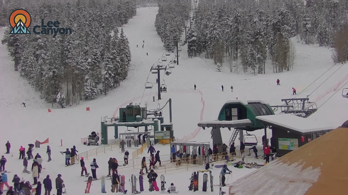 Opening day at Lee Canyon!  Looks like a few people heard they've received a bunch of snow... not to mention the manmade stuff.  Pic from their webcam a short time ago.