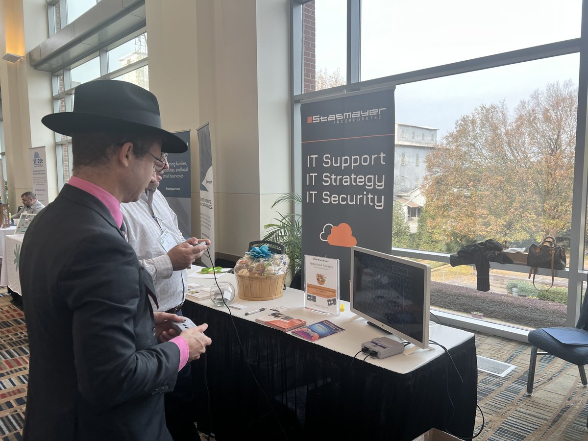 Stasmayer's tweet image. Great day at the #SCACPAcade! Our CEO, Richard Krenmayer, shared powerful insights on Fraud Protection, Cybersecurity, and AI — and we hope our booth added a little nostalgia to your day with a classic Super Nintendo 🎮Thank you @SouthCarolinaAssociationofCPAS for a great event!