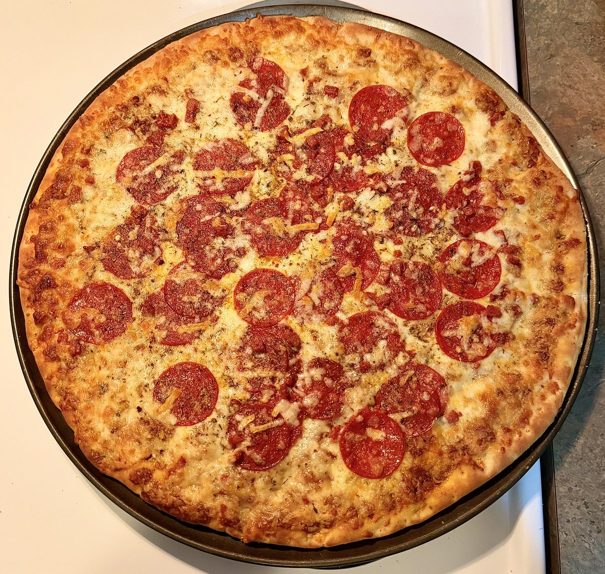 The weekend has officially started, and the Friday night pizza is ready! 🍕 #FridayVibes #Pizza