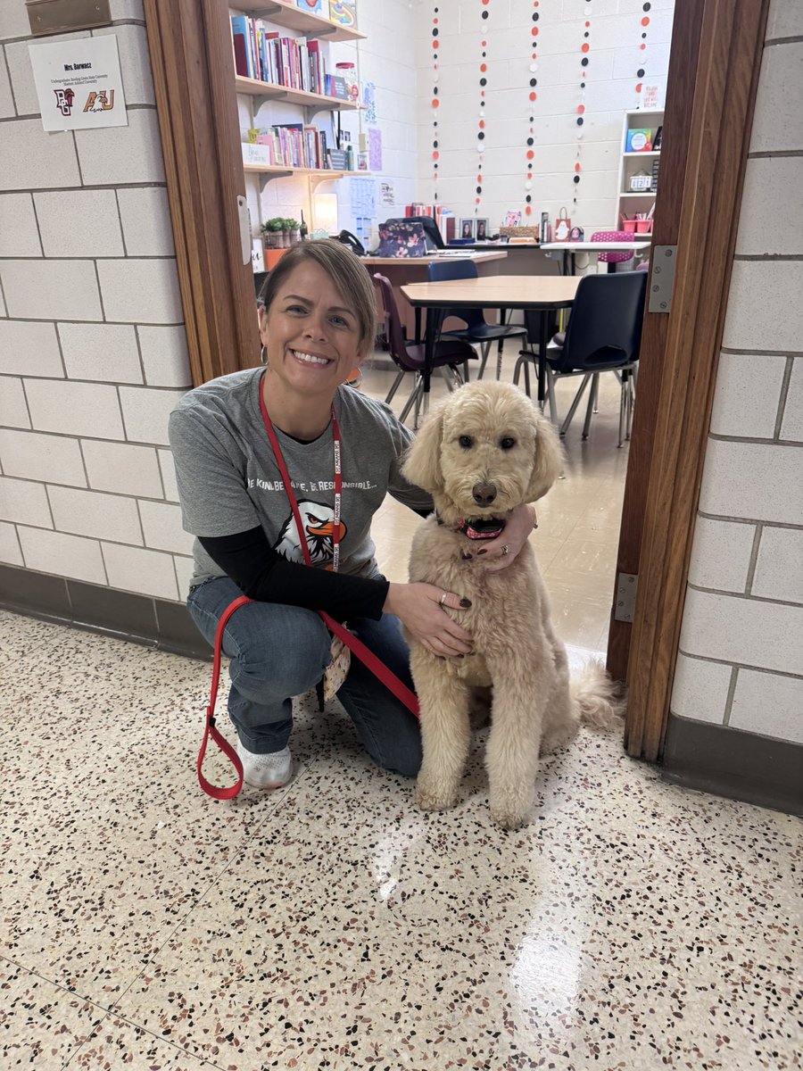 When your workday includes hanging out with the sweetest school visitor… best. day. ever. 🐾🧡🖤 <a href="/NOCSEagles/">NorthOlmstedSchools</a>