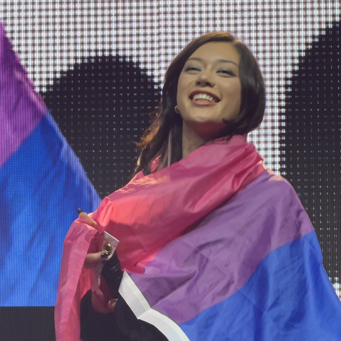 leiforteza's tweet image. megan wrapping the bi flag around herself with the biggest smile on her face is making me so emotional like i’m actually not ok