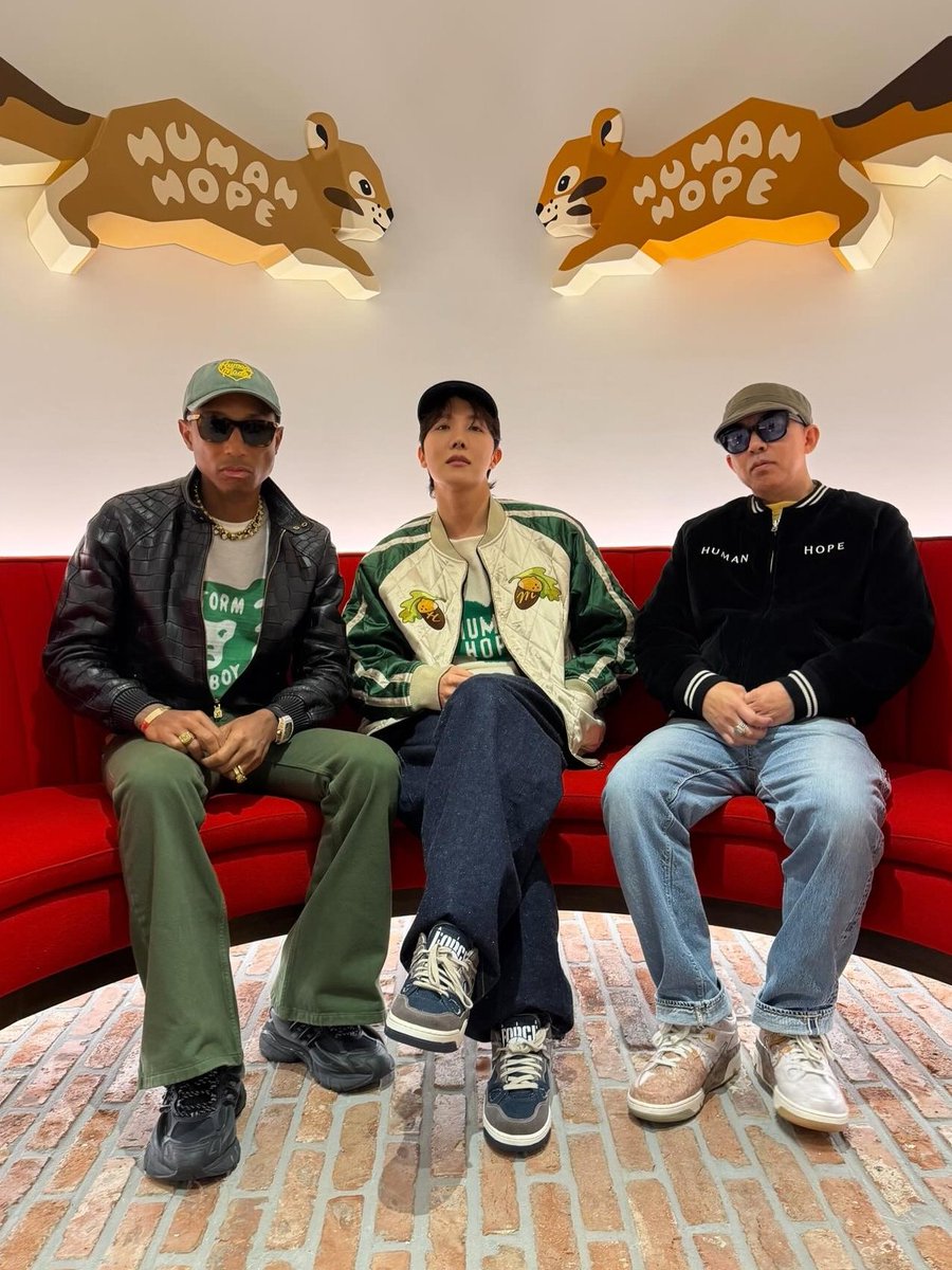 j-hope stuns with NIGO and Pharrell Williams at the opening of Human Made’s new Apgujeong store.