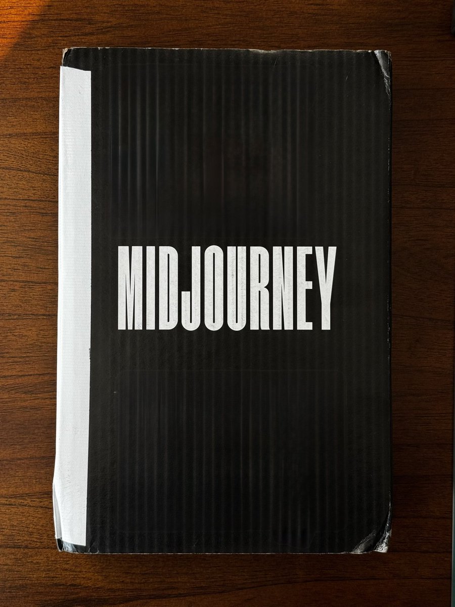 nigelsibisi's tweet photo. It’s finally here. 

@midjourney’s selection of AI generated images from its first year. 

Of course I didn’t buy it just because it’s a hard cover book. https://t.co/7C9jMcZG6C