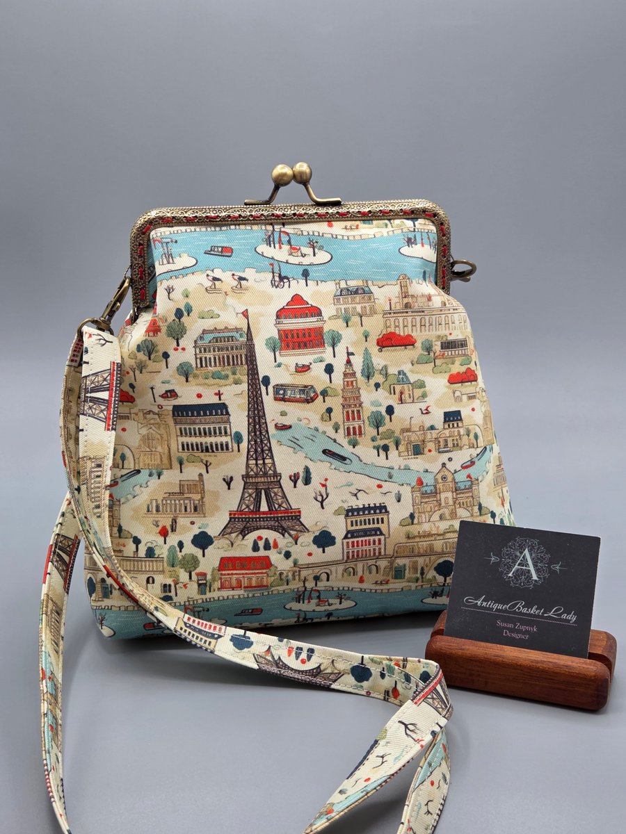 Antiquebasket's tweet image. Paris Cityscape Crossbody Purse: Vintage Style Kiss Lock Bag w by Antiquebasketlady 
 etsy.me/3Xd4h6f via @Etsy #travel #Eiffeltower #handmadehandbag