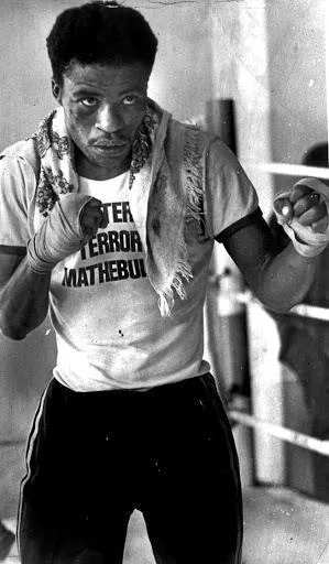 HistorySAZAR's tweet photo. Boxer Peter 'Terror' Mathebula, c 1980s. On 13 December 1980, Mathebula became South Africa’s first black world champion when he dethroned South Korea’s Tae-Shik Kim in Los Angeles, California, USA. Image Source: Saho https://t.co/vQbhrY37qZ