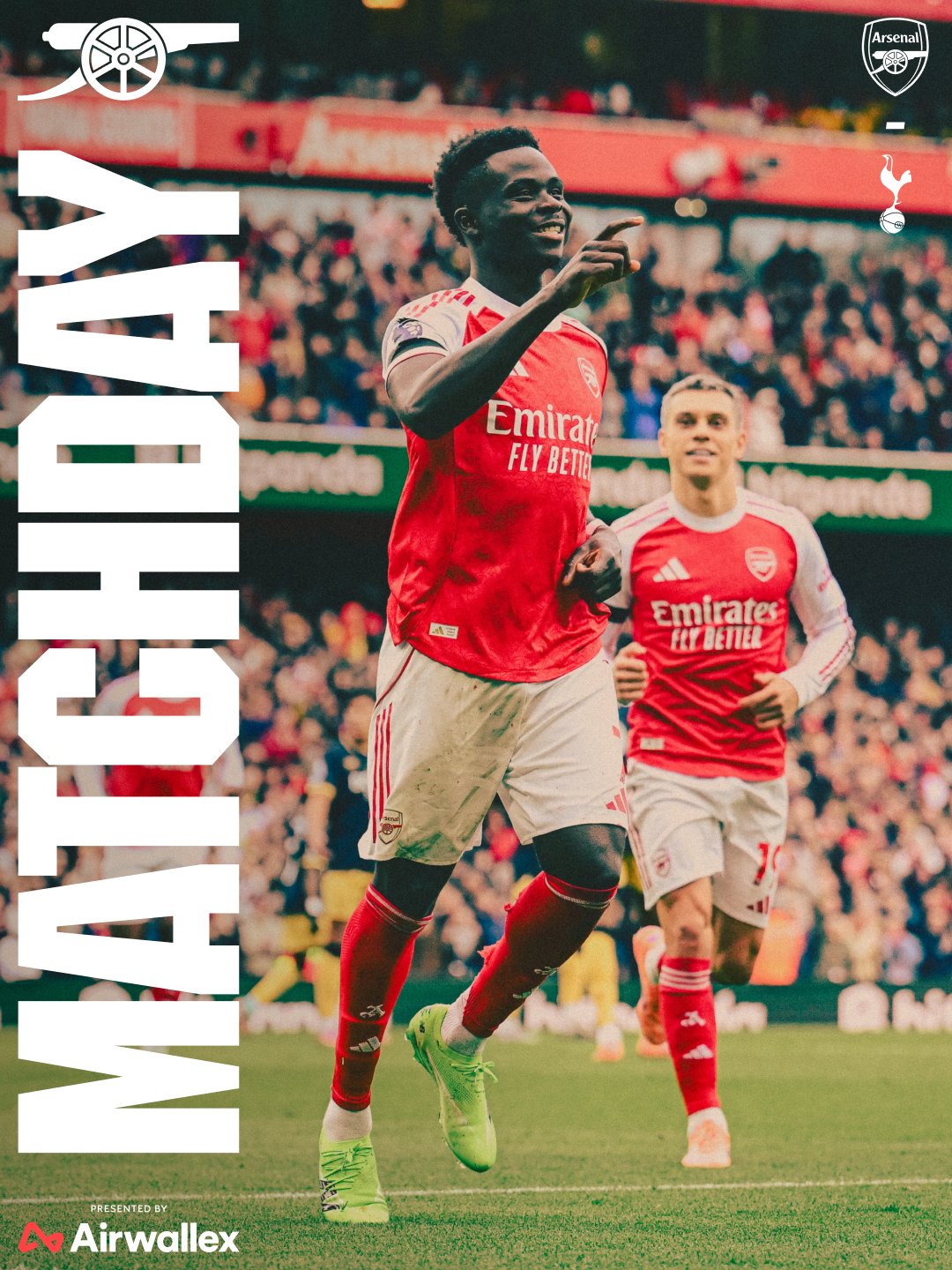 Arsenal matchday graphic for the North London derby against Tottenham, featuring Bukayo Saka celebrating during a home game with Leandro Trossard just behind him.