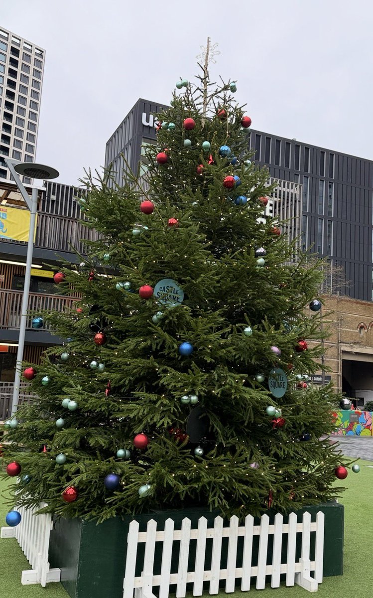 forwardnotback's tweet image. First #London #ChristmasTree of the day is a lovely tree  from a very windy and wet #ElephantSquare - Elephant &amp;amp; Castle in old money