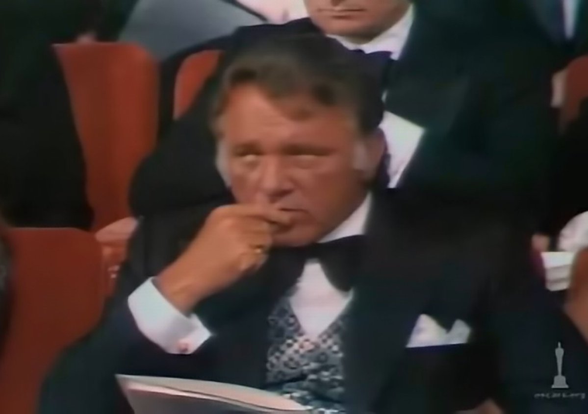 Richard Burton looking like he's considering the desert menu at the 1969 oscars.