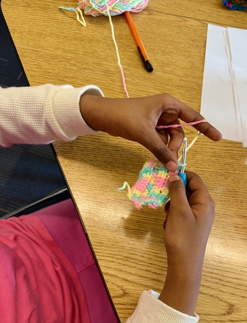 LoriTecler's tweet image. Crochet club is making progress on their coffee cup cozies! Some are finished &amp;amp; many are well underway. There was some resistance at first to doing a project together instead of doing their own thing, but they&apos;re proud of having something to show for their efforts. #SchoolLibrary