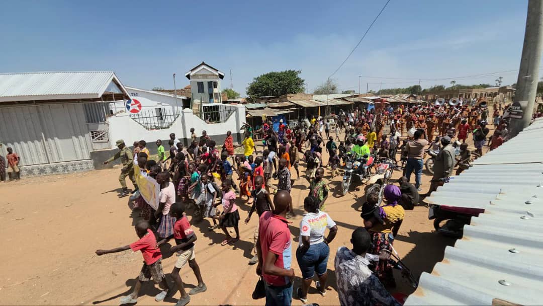 PamAtuheirek's tweet image. The buildup begins in Kotido town with a grand procession led by the Uganda Prisons band for the #KAPATUProject Thanksgiving. #KAPATUnveiling #KAPATU