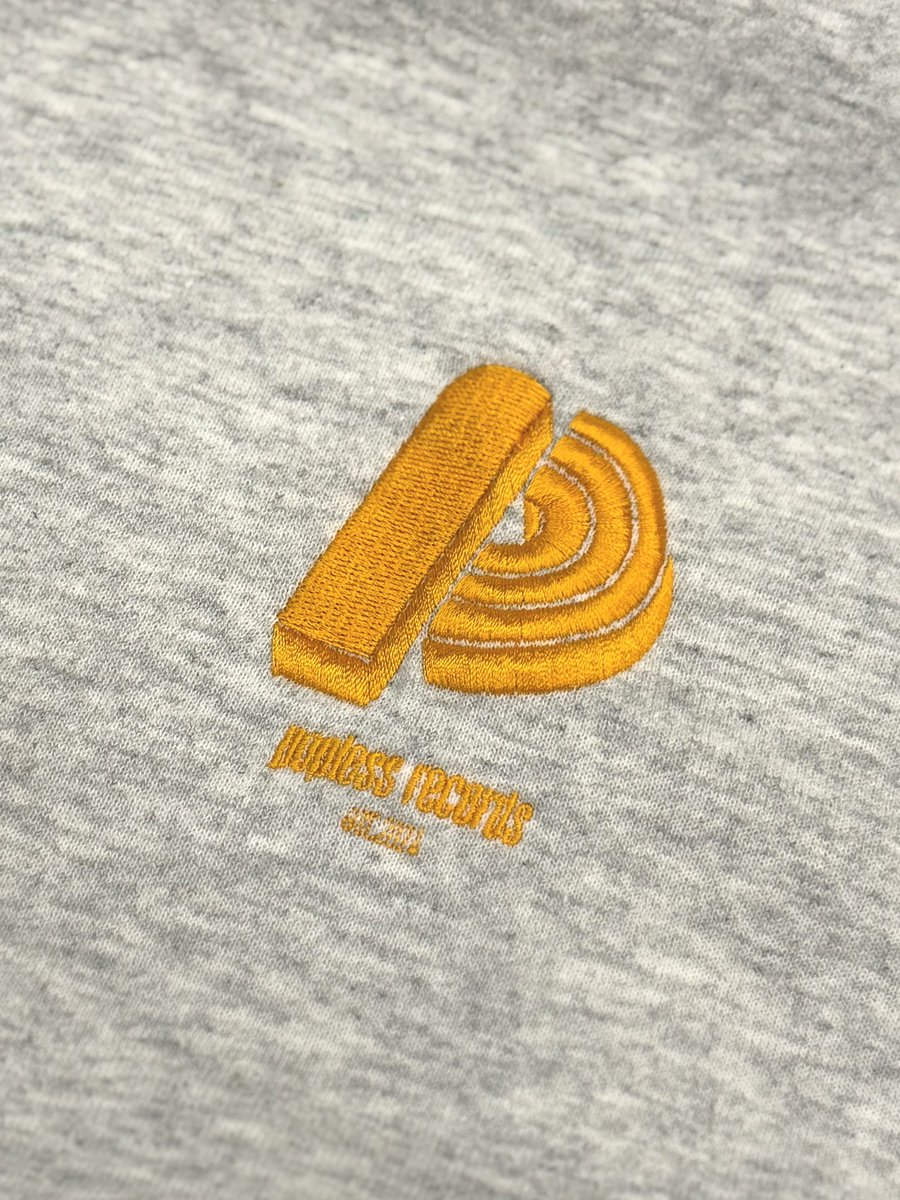 ____u's tweet image. 🟠Label New Goods🟠

刺繍hoodie出しました！
color：ash / light blue

製造費を除く売り上げは全額、
能登半島地震&amp;amp;大雨災害の支援金として
寄付させていただきます。

椎木弾き語りライブの会場で販売させてもらいます！