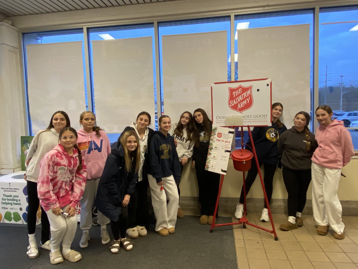G2012 and G2014 took turns ringing the bell for the Salvation Army. Good people, doing a good deed, and having a good time!