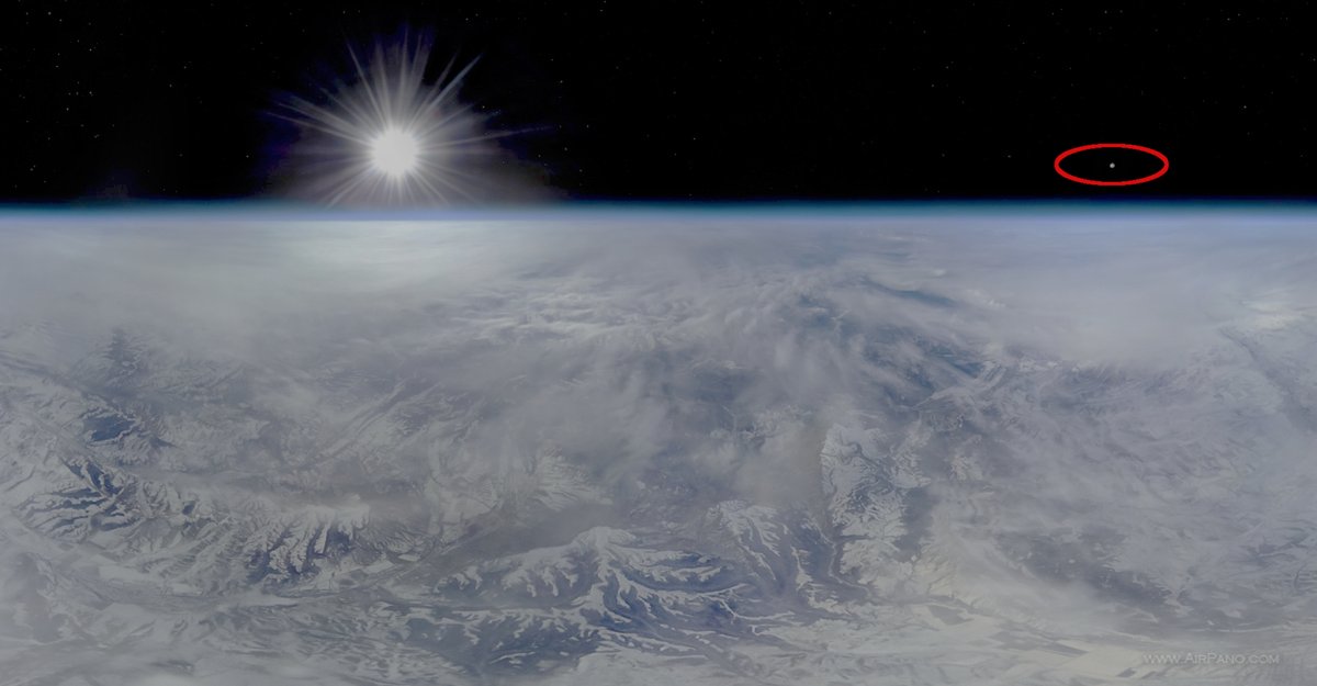 Sun, Moon (circled) and stars over a horizontal motionless Earth.

There is NO Earth curvature in reality.