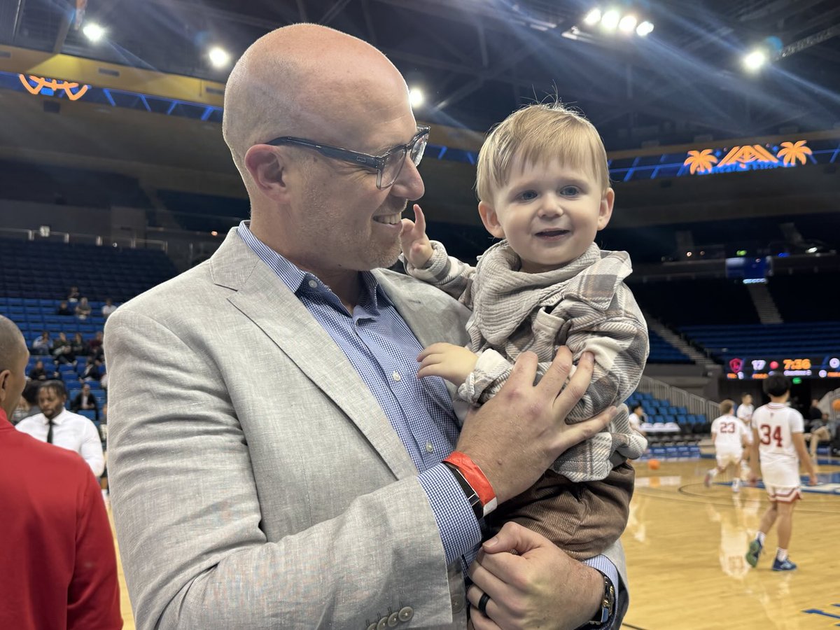Todd Wolfson of St. Francis with his future 6-8 son.