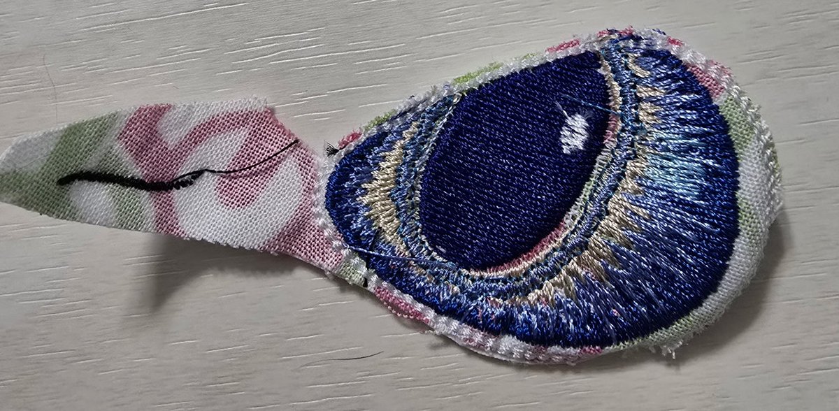 Advice wanted for embroidery! 
For Christmas we are making my child and 3ft light fury plush and with the pattern it came with the eye pattern at well (this was a test piece on cotton) does anyone have any expertise for stabilizing the pattern on the minky?